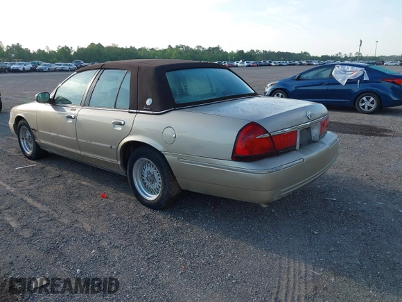 1999 Mercury Grand Marquis LS z VIN 2MEFM75W1XX703878, wystawiony jako IAAI lot #42074187 z przebiegiem 56 962 mil mil oraz . Historia ofert i sprzedaży dostępna na DreamBid. Obrazek 3.