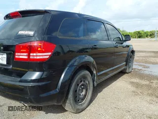 2014 Dodge Journey SE with VIN 3C4PDCAB7ET116651, listed as a IAAI auction lot 42762513 with 197,808 mi miles and . Bid and sale history available at DreamBid. Image 4.