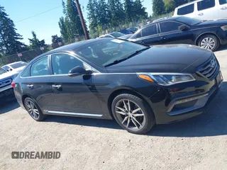 2015 Hyundai Sonata Sport z VIN 5NPE34AB5FH198560, wystawiony jako IAAI lot #42467031 z przebiegiem 96 111 mil mil oraz . Historia ofert i sprzedaży dostępna na DreamBid. Obrazek 13.