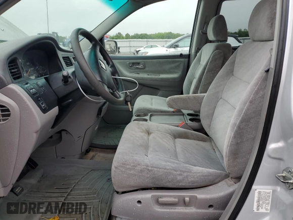 2003 Honda Odyssey EX z VIN 5FNRL18603B008148, wystawiony jako Copart lot #60669825 z przebiegiem 128 115 mil mil oraz Czysty tytuł • Clean title. Historia ofert i sprzedaży dostępna na DreamBid. Obrazek 7.
