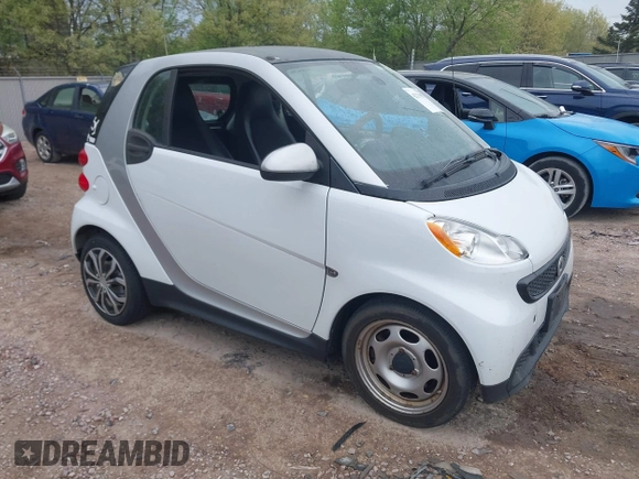 2014 Smart fortwo Pure with VIN WMEEJ3BA5EK749285, listed as a IAAI auction lot 42231893 with 119,507 mi miles and . Bid and sale history available at DreamBid. Image 1.