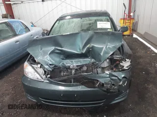 2004 Toyota Camry LE with VIN 4T1BE30K54U377818, listed as a IAAI auction lot 41931027 with 212,690 mi miles. Bid and sale history available at carsss.com. Image 12.