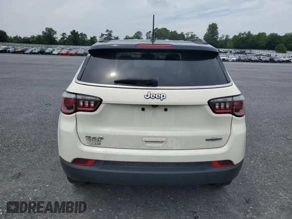 2018 Jeep Compass Latitude with VIN 3C4NJDBB2JT177663, listed as a Copart auction lot 64429065 with 149,317 mi miles and Salvage title. Bid and sale history available at DreamBid. Image 6.