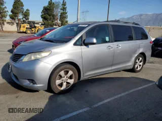 2011 Toyota Sienna LE AAS with VIN 5TDKK3DC9BS037492, listed as a Copart auction lot 63908785 with 114,162 mi miles and Salvage title. Bid and sale history available at DreamBid. Image 1.