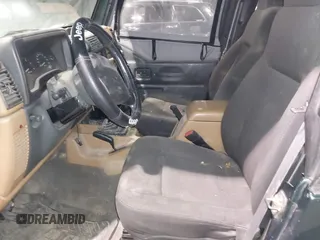 1999 Jeep Wrangler SE with VIN 1J4FY29P4XP457291, listed as a IAAI auction lot 41549758 with 133,362 mi miles and . Bid and sale history available at DreamBid. Image 8.
