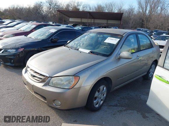 2004 Kia Spectra LX with VIN KNAFE121545043455, listed as a IAAI auction lot 41441356 with 189,566 mi miles. Bid and sale history available at carsss.com. Image 2.