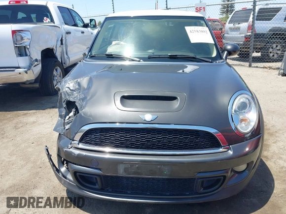 2013 MINI Hardtop S with VIN WMWSV3C52DT396453, listed as a IAAI auction lot 42583892 with 143,190 mi miles and . Bid and sale history available at DreamBid. Image 13.