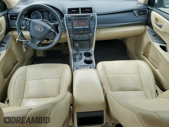 2015 Toyota Camry LE z VIN 4T1BD1FK6FU164748, wystawiony jako Copart lot #54667565 z przebiegiem 139 804 mil mil oraz Szkoda całkowita • Salvage title. Historia ofert i sprzedaży dostępna na DreamBid. Obrazek 8.
