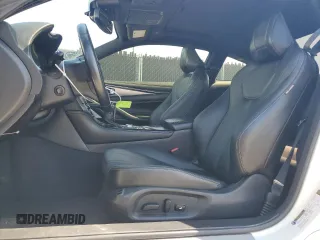 2021 Infiniti Q60 Luxe with VIN JN1EV7KLXMM470206, listed as a Copart auction lot 57438745 with 54,403 mi miles and Clean title. Bid and sale history available at DreamBid. Image 7.