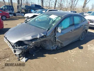 2014 Ford Focus SE with VIN 1FADP3F28EL388713, listed as a IAAI auction lot 41667908 with 125,294 mi miles. Bid and sale history available at carsss.com. Image 2.