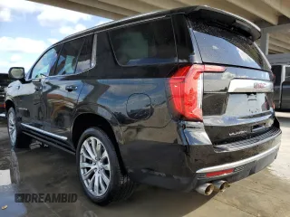 2023 GMC Yukon Denali with VIN 1GKS1DKL1PR207706, listed as a Copart auction lot 80937344 with 30,706 mi miles and Clean Title. Bid and sale history available at carsss.com. Image 2.