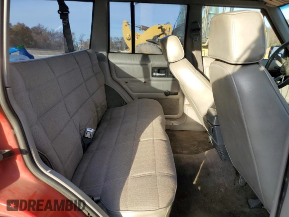1994 Jeep Cherokee Sport with VIN 1J4FJ68S3RL239208, listed as a Copart auction lot 79121184 with 226,579 mi miles and Salvage title. Bid and sale history available at DreamBid. Image 11.