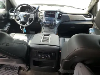 2015 Chevrolet Tahoe LTZ with VIN 1GNSKCKC9FR698924, listed as a Copart auction lot 56196895 with 184,740 mi miles and Salvage title. Bid and sale history available at DreamBid. Image 8.