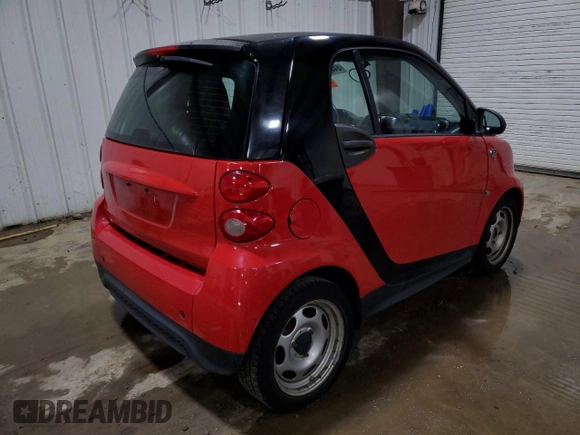 2015 Smart fortwo Passion with VIN WMEEJ3BA0FK797374, listed as a Copart auction lot 64472605 with 135,576 mi miles and Clean title. Bid and sale history available at DreamBid. Image 3.