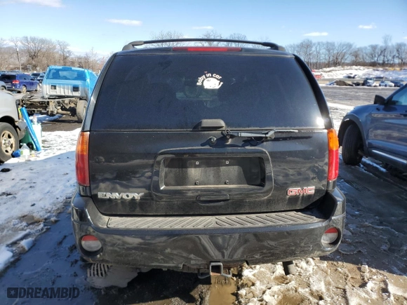 2005 GMC Envoy SLE with VIN 1GKDT13S652103368, listed as a Copart auction lot 44409075 with 97,022 mi miles and Salvage Title. Bid and sale history available at carsss.com. Image 6.