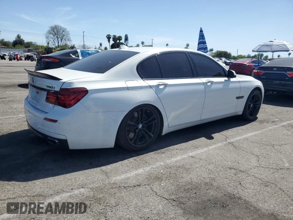 2013 BMW 7 Series 750i with VIN WBAYA8C54DC996412, listed as a Copart auction lot 56982895 with 124,258 mi miles and Salvage title. Bid and sale history available at DreamBid. Image 3.