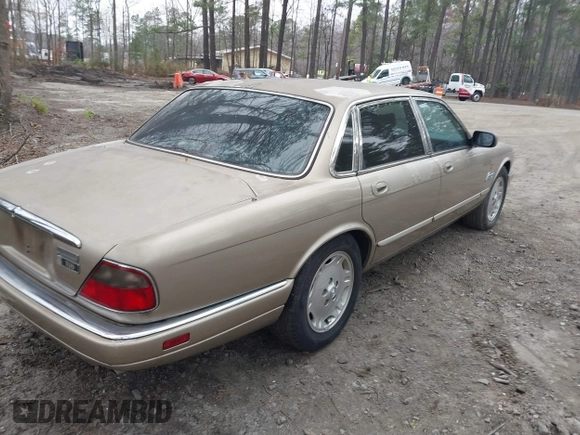 1997 Jaguar XJ with VIN SAJHX1245VC788530, listed as a IAAI auction lot 41768247 with 215,807 mi miles and . Bid and sale history available at DreamBid. Image 4.