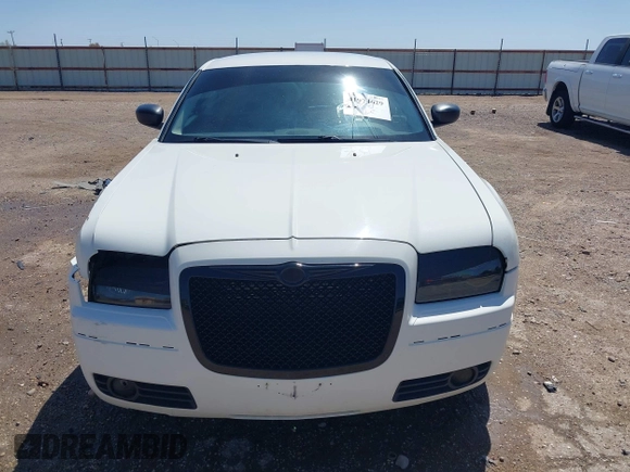 2009 Chrysler 300 Touring with VIN 2C3KA53V89H634048, listed as a IAAI auction lot 41974629 with Not Provided miles and . Bid and sale history available at DreamBid. Image 12.