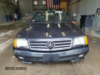 1992 Mercedes-Benz 500 z VIN WDBFA66E2NF038636, wystawiony jako Copart lot #55522605 z przebiegiem 92 002 mil mil oraz Szkody całkowita. Historia ofert i sprzedaży dostępna na DreamBid. Obrazek 5.