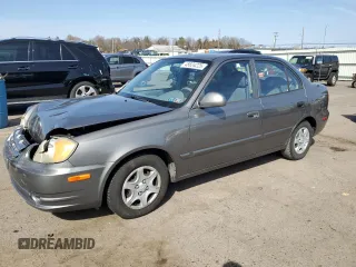 2005 Hyundai Accent GLS with VIN KMHCG45C65U625887, listed as a Copart auction lot 48824225 with 110,594 mi miles and Salvage Title. Bid and sale history available at carsss.com. Image 1.