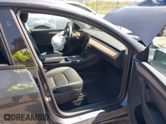 2023 Tesla Model Y Long Range z VIN 7SAYGDEE8PA191415, wystawiony jako IAAI lot #42155577 z przebiegiem 42 149 mil mil oraz . Historia ofert i sprzedaży dostępna na DreamBid. Obrazek 5.