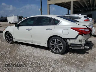 2016 Nissan Altima SL with VIN 1N4AL3AP7GC276084, listed as a Copart auction lot 60063415 with 102,301 mi miles and Salvage title. Bid and sale history available at DreamBid. Image 2.