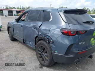 2024 Mazda CX-50 S Select z VIN 7MMVABAMXRN191832, wystawiony jako IAAI lot #41946922 z przebiegiem 15 850 mil mil oraz . Historia ofert i sprzedaży dostępna na DreamBid. Obrazek 6.