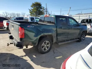 2015 Chevrolet Colorado 4WD Z71 with VIN 1GCGTCE3XF1251671, listed as a Copart auction lot 42787115 with 55,778 mi miles and Salvage Title. Bid and sale history available at carsss.com. Image 3.