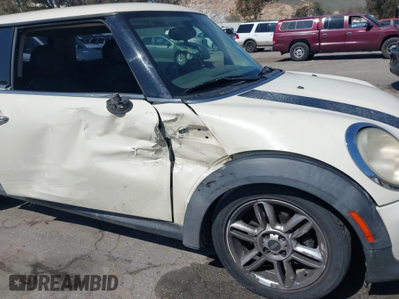 2011 MINI Hardtop with VIN WMWSU3C53BTX97140, listed as a IAAI auction lot 41861648 with 111,899 mi miles and . Bid and sale history available at DreamBid. Image 6.