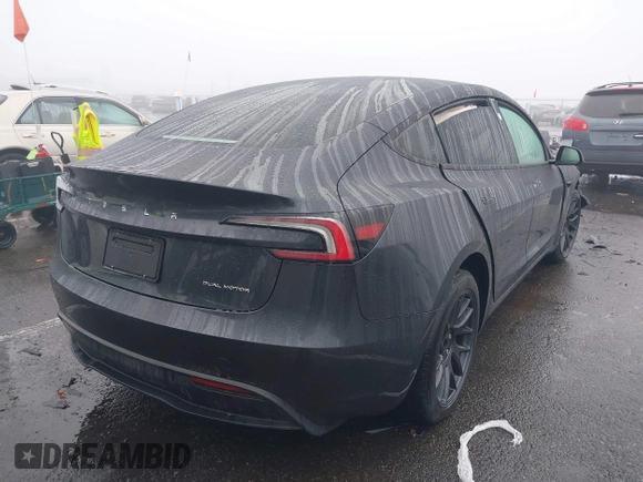 2024 Tesla Model 3 Long Range with VIN 5YJ3E1EB2RF815376, listed as a IAAI auction lot 41565549 with 10,377 mi miles and . Bid and sale history available at DreamBid. Image 4.