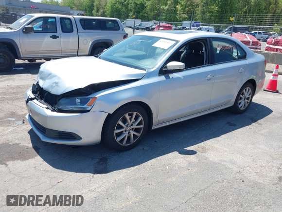 2012 Volkswagen Jetta SE with VIN 3VWDP7AJ8CM465069, listed as a IAAI auction lot 42202597 with 106,963 mi miles and . Bid and sale history available at DreamBid. Image 2.