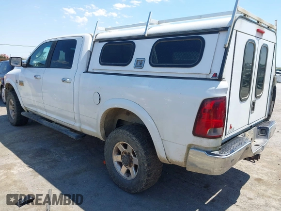 2012 Ram 2500 Laramie with VIN 3C6UD5FL1CG309889, listed as a IAAI auction lot 42484013 with 245,986 mi miles and . Bid and sale history available at DreamBid. Image 3.