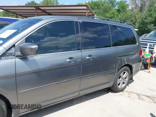 2010 Honda Odyssey Touring with VIN 5FNRL3H90AB053710, listed as a IAAI auction lot 42577646 with 255,351 mi miles and . Bid and sale history available at DreamBid. Image 6.