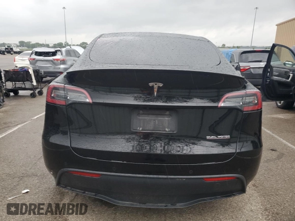 2022 Tesla Model Y Performance с VIN 7SAYGDEF5NF554018, выставлен на аукционе Copart как лот 65062185 с пробегом Не указан миль и Списание • Salvage title. История ставок и продаж доступна на DreamBid. Изображение 6.