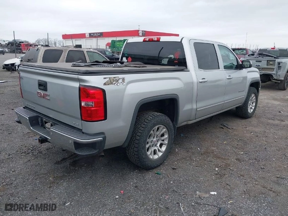 2014 GMC Sierra 1500 SLE with VIN 3GTU2UEC0EG558486, listed as a IAAI auction lot 41750451 with 173,098 mi miles. Bid and sale history available at carsss.com. Image 4.