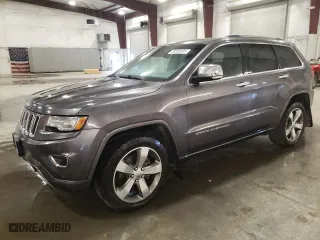 2014 Jeep Grand Cherokee Overland with VIN 1C4RJFCG6EC279248, listed as a Copart auction lot 49300895 with 165,248 mi miles and Salvage Title. Bid and sale history available at carsss.com. Image 1.