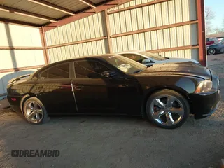 2014 Dodge Charger SXT with VIN 2C3CDXHG9EH305256, listed as a IAAI auction lot 41360219 with 170,192 mi miles and . Bid and sale history available at DreamBid. Image 13.
