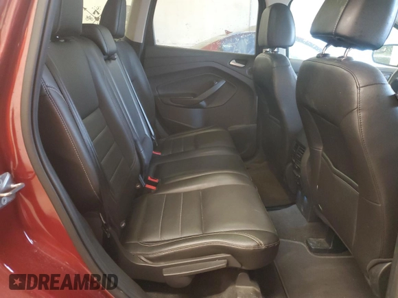 2015 Ford Escape Titanium z VIN 1FMCU9J97FUC04911, wystawiony jako Copart lot #62403715 z przebiegiem 211 354 mil mil oraz Czysty tytuł • Clean title. Historia ofert i sprzedaży dostępna na DreamBid. Obrazek 10.