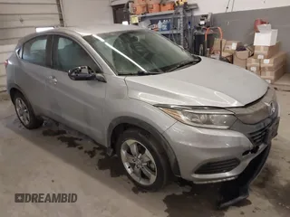 2021 Honda HR-V LX with VIN 3CZRU6H33MM746713, listed as a IAAI auction lot 41973303 with 56,476 mi miles. Bid and sale history available at carsss.com. Image 1.