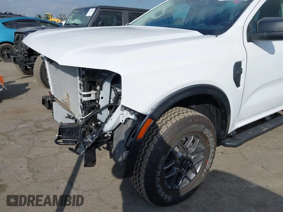 2024 Ford Ranger with VIN 1FTER4HPXRLE39741, listed as a IAAI auction lot 41471689 with 301 mi miles and . Bid and sale history available at DreamBid. Image 19.