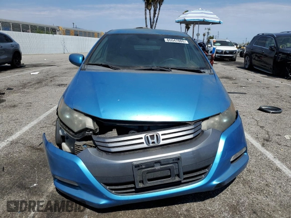 2010 Honda Insight LX with VIN JHMZE2H51AS028849, listed as a Copart auction lot 65547805 with 209,316 mi miles and Salvage title. Bid and sale history available at DreamBid. Image 5.