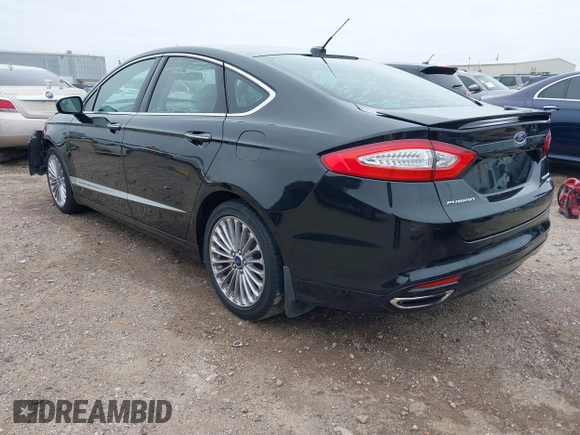 2014 Ford Fusion Titanium with VIN 3FA6P0K9XER364392, listed as a IAAI auction lot 41642439 with 130,302 mi miles and . Bid and sale history available at DreamBid. Image 3.