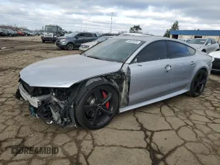 2018 Audi RS 7 Prestige z VIN WUAWAAFC9JN900255, wystawiony jako Copart lot #83024534 z przebiegiem 53 363 mil mil oraz Szkody całkowita. Historia ofert i sprzedaży dostępna na DreamBid. Obrazek 1.