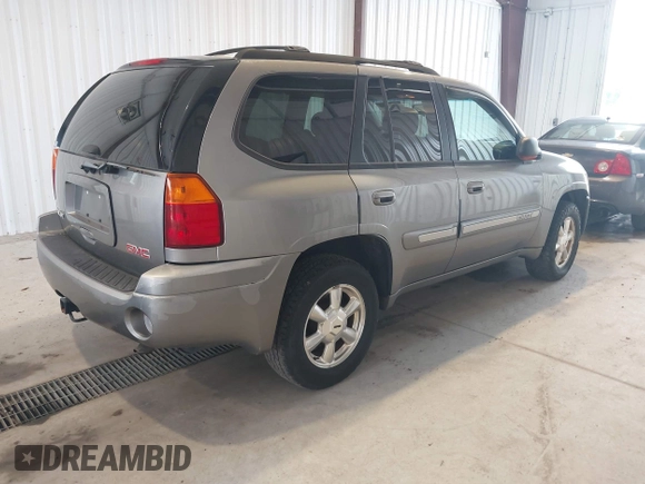 2005 GMC Envoy SLE z VIN 1GKDT13S252285747, wystawiony jako IAAI lot #42340642 z przebiegiem Nie podano mil oraz . Historia ofert i sprzedaży dostępna na DreamBid. Obrazek 4.