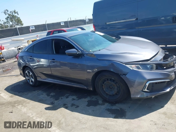 2020 Honda Civic LX with VIN 2HGFC2F67LH551651, listed as a IAAI auction lot 41861966 with 205,619 mi miles and . Bid and sale history available at DreamBid. Image 13.