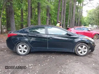 2013 Hyundai Elantra GLS z VIN KMHDH4AE0DU545363, wystawiony jako IAAI lot #42281675 z przebiegiem 129 249 mil mil oraz . Historia ofert i sprzedaży dostępna na DreamBid. Obrazek 13.
