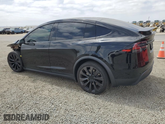 2022 Tesla Model X with VIN 7SAXCDE59NF360610, listed as a Copart auction lot 52575365 with 51,557 mi miles and Salvage Title. Bid and sale history available at carsss.com. Image 2.