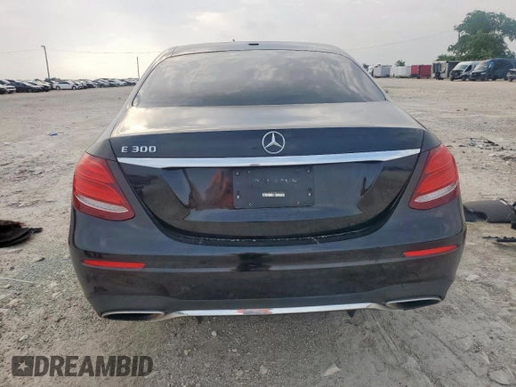 2019 Mercedes-Benz E 300 with VIN WDDZF4JB2KA618999, listed as a Copart auction lot 56915465 with 64,077 mi miles and Salvage title. Bid and sale history available at DreamBid. Image 6.