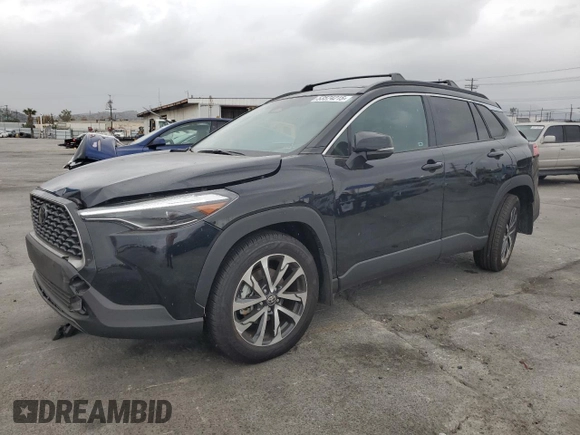 2024 Toyota Corolla Cross XLE with VIN 7MUDAAAG8RV095021, listed as a Copart auction lot 59232265 with 7,010 mi miles and Salvage title. Bid and sale history available at DreamBid. Image 1.