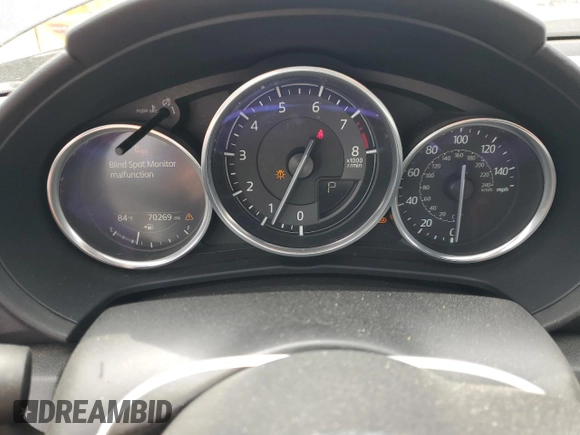 2021 Mazda MX-5 Miata Grand Touring with VIN JM1NDAM70M0460532, listed as a Copart auction lot 58828045 with 70,269 mi miles and Salvage title. Bid and sale history available at DreamBid. Image 9.